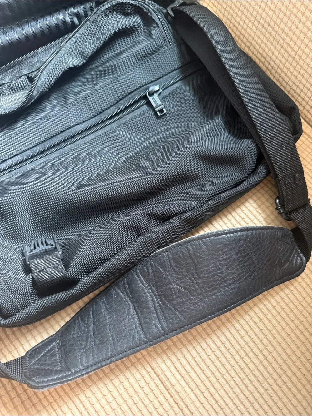 Tumi Black Nylon Messenger Bag with Subtle Stripe Lining